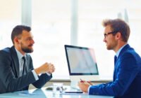 Career counsellor guiding student for study abroad plans
